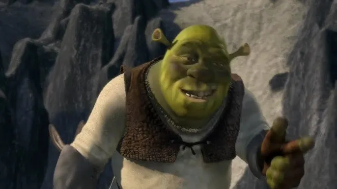 Shrek pointing with his finger and smiling