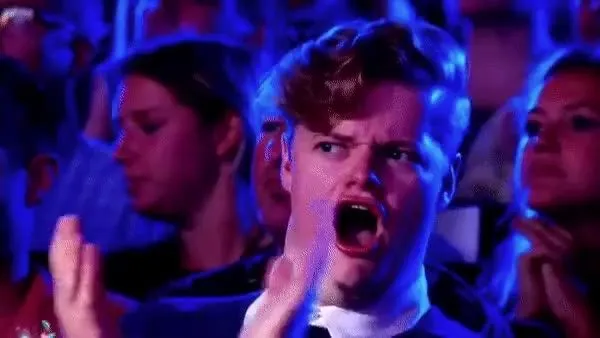 The meme of the guy clapping in the crowd, impressed