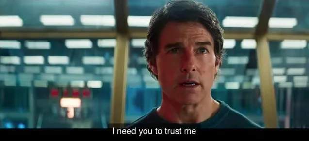 Tom Cruise in Top Gun with the subtitles 'I need you to trust me;