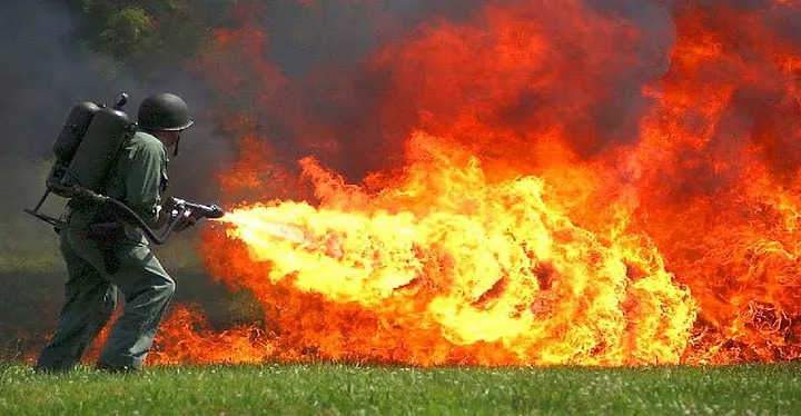 A guy shooting a flamethrower